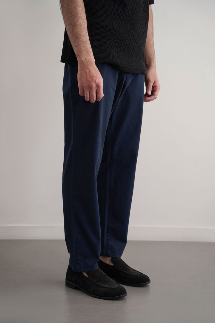 NAVY TAPERED CHINOS