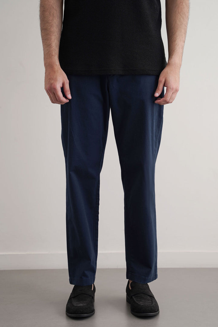 NAVY TAPERED CHINOS