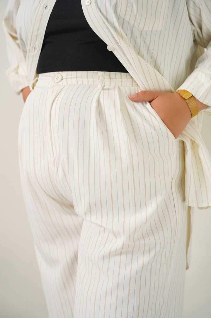 CREAM CURVE STRIPED PANTS
