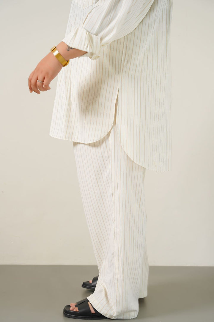 CREAM CURVE STRIPED PANTS