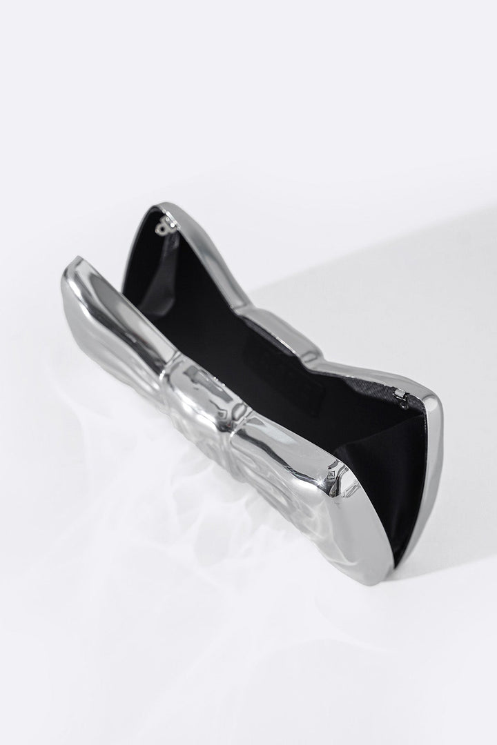 SILVER BOWTIE METAL CLUTCH