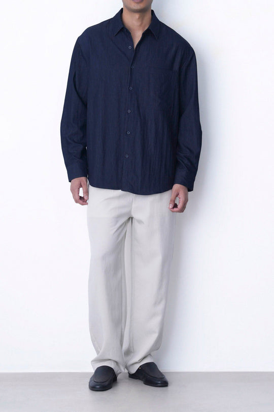 IVORY RELAXED FIT PLEATED PANTS