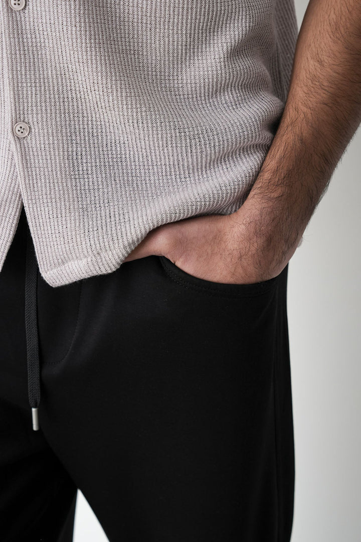 BLACK PANELLED TROUSERS