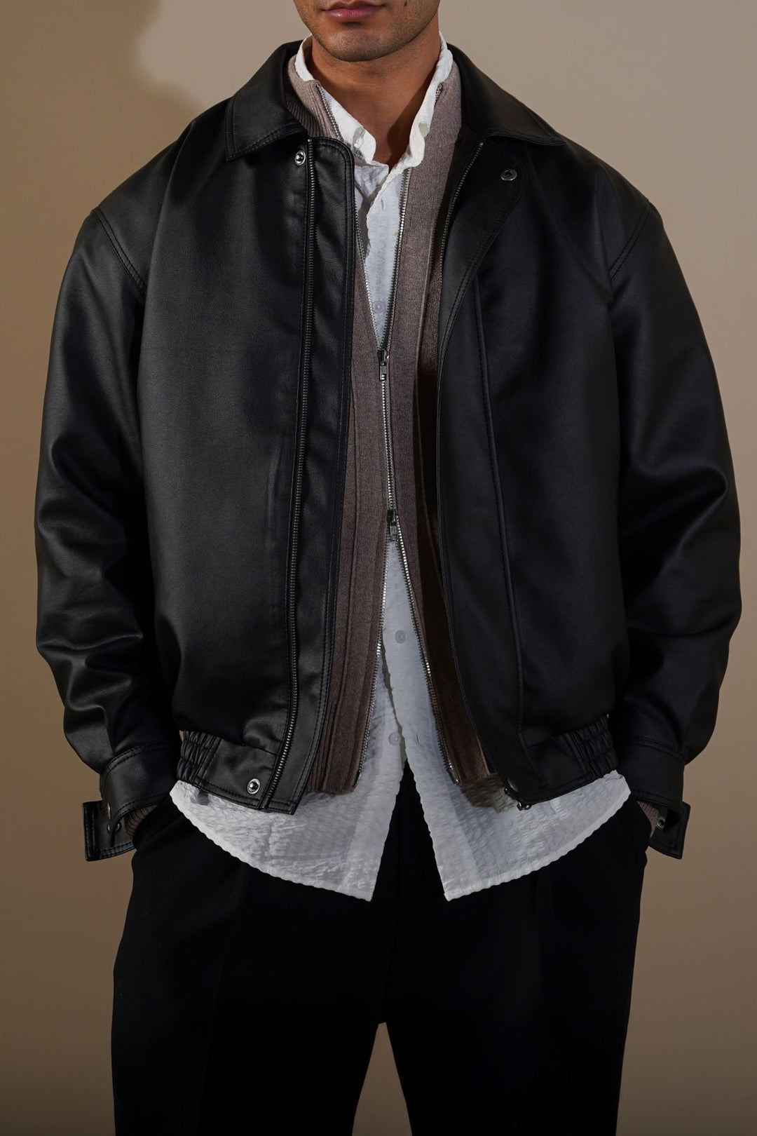 BLACK OVERSIZED FAUX LEATHER BOMBER