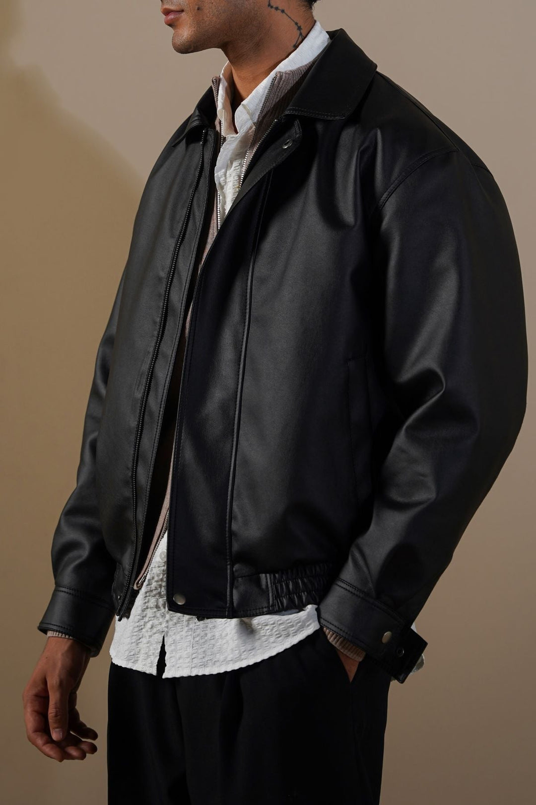 BLACK OVERSIZED FAUX LEATHER BOMBER