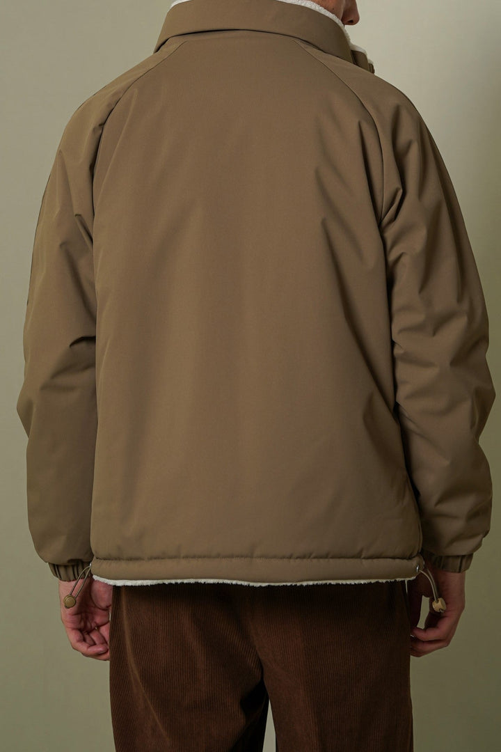 BROWN REVERSIBLE SHERPA PUFFER