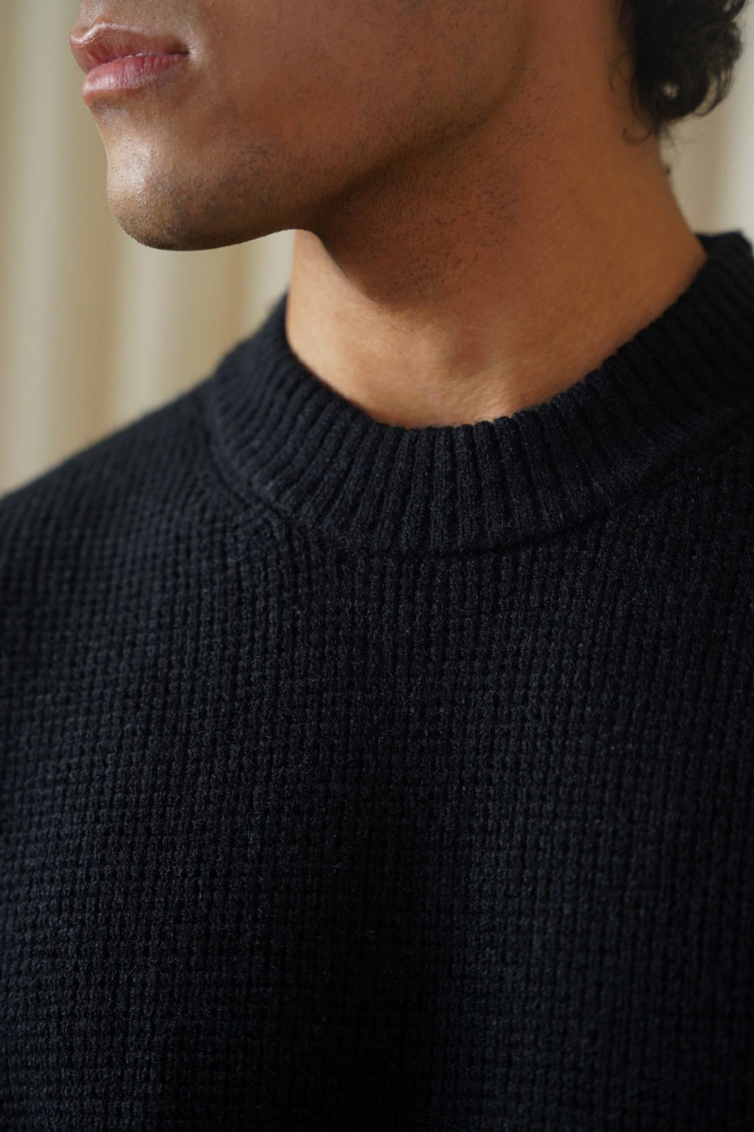BLACK WAFFLE KNIT SWEATER