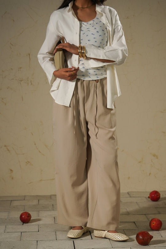 BEIGE PANTS WITH STATEMENT DRAWSTRING