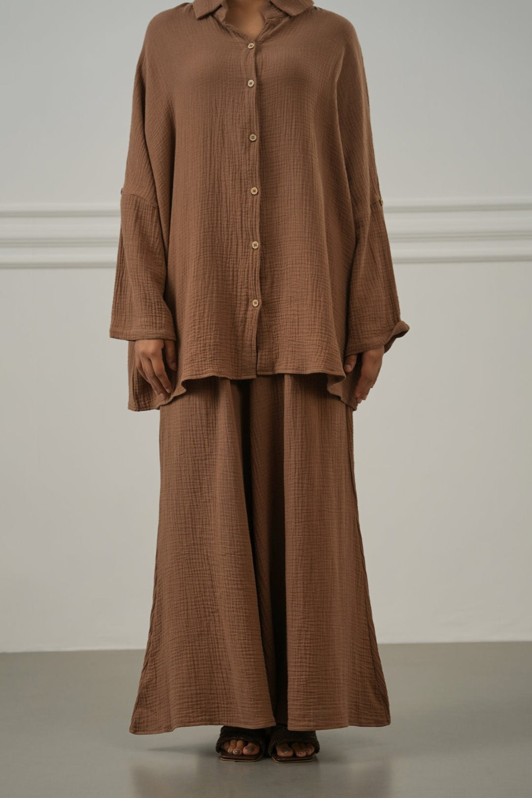 BROWN SMOCKED WAIST MUSLIN PANTS
