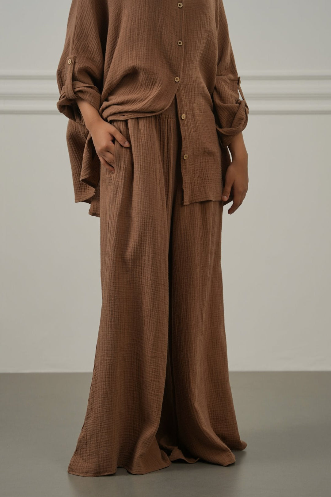 BROWN SMOCKED WAIST MUSLIN PANTS