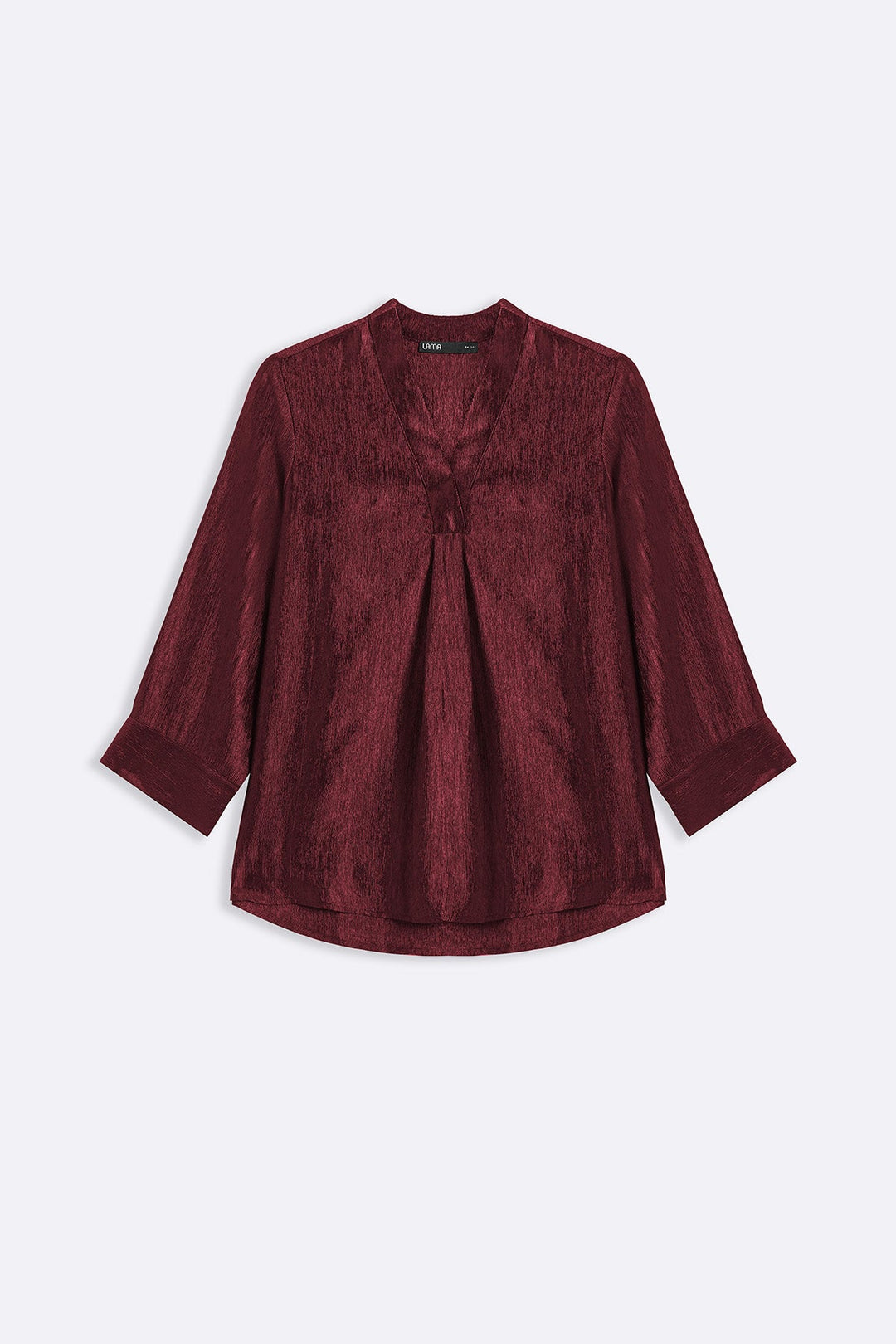RUST TEXTURED FLOWY V NECK TOP
