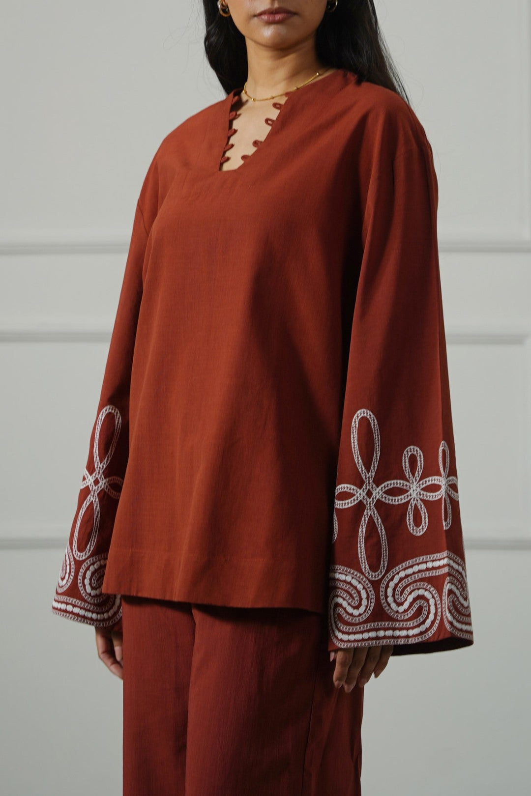 RUST WINE KORU TUNIC