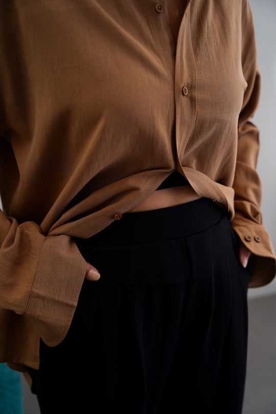 BLACK STRETCHY PLEATED TROUSERS