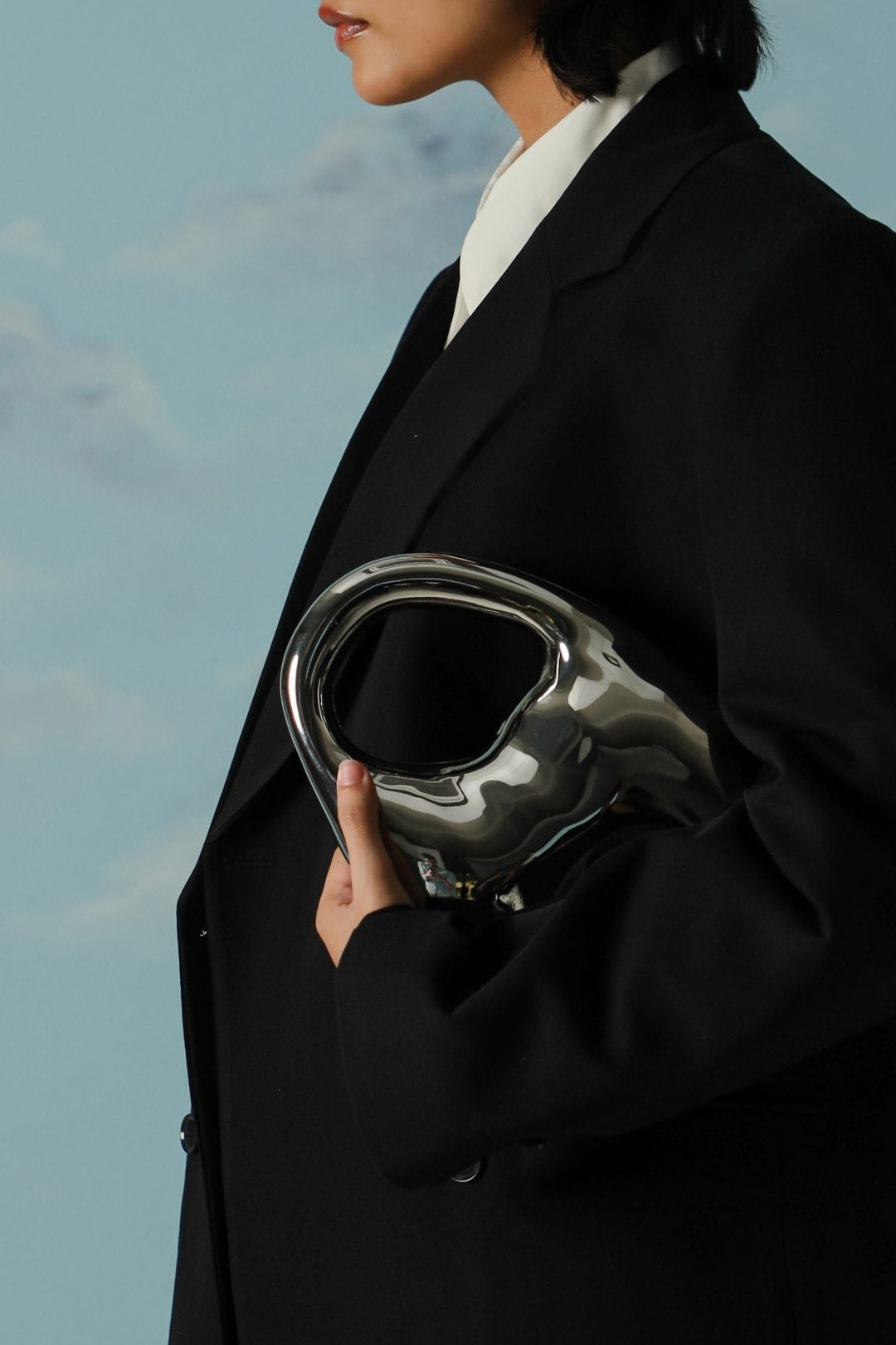 SILVER RUNWAY EDITORIAL CLUTCH