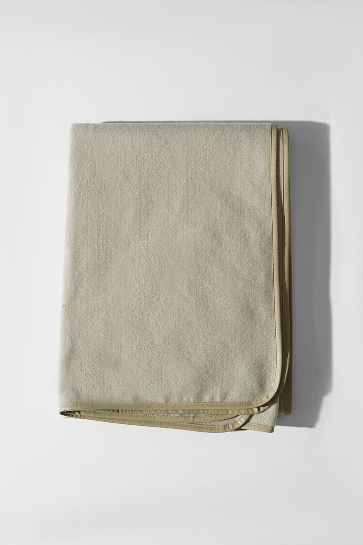 CREAM EDGE LINED CAPE