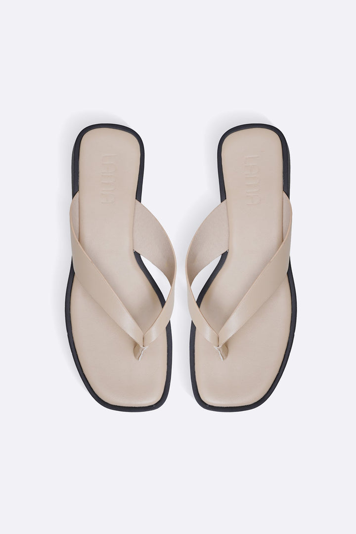 BEIGE MAGAZINE FLIP FLOPS