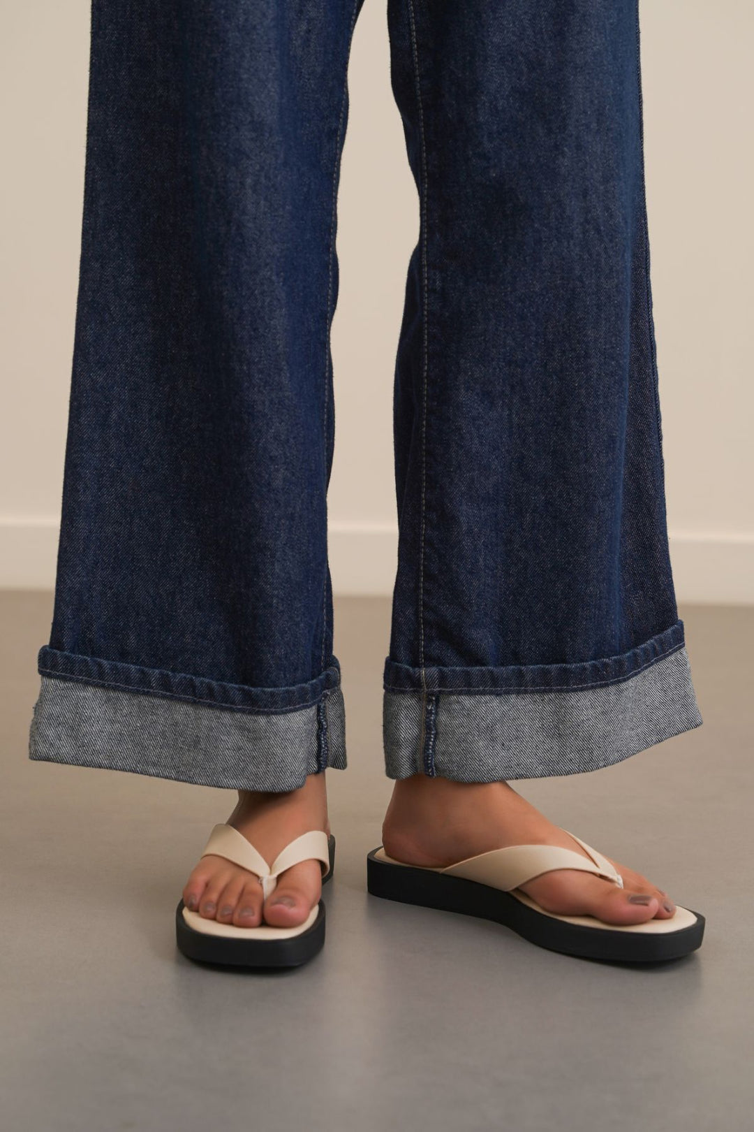 BEIGE MAGAZINE FLIP FLOPS