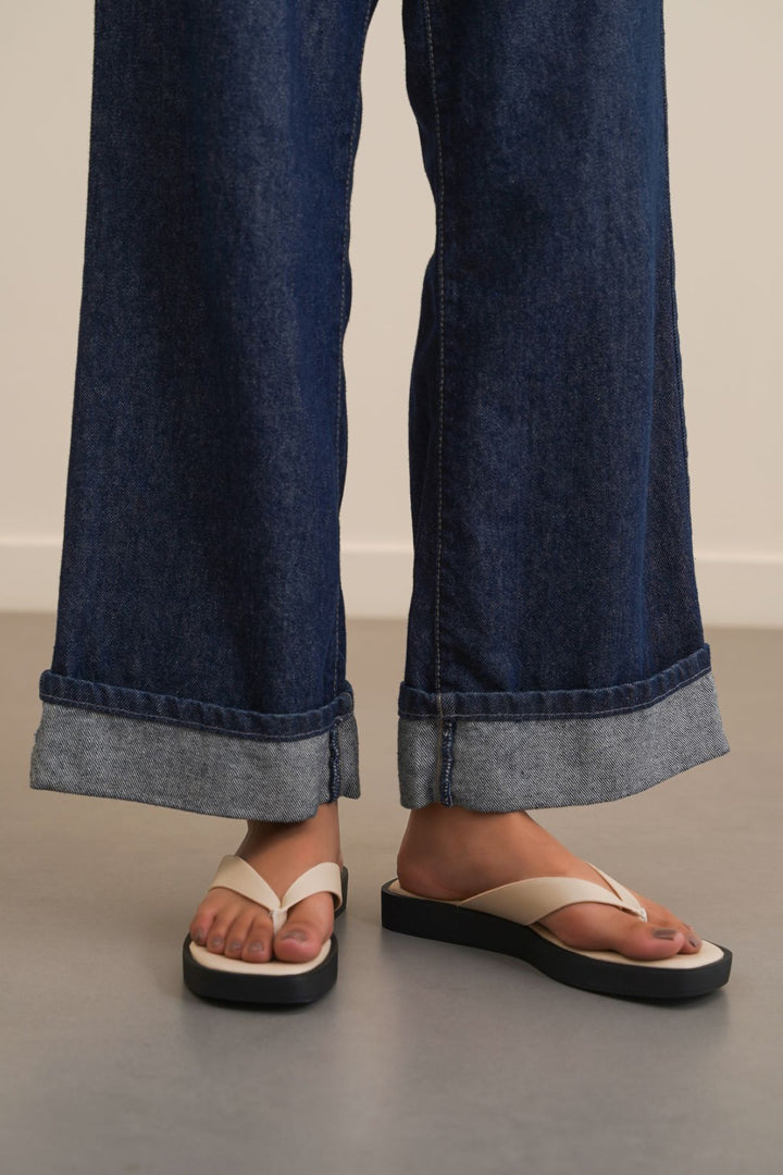 BEIGE MAGAZINE FLIP FLOPS