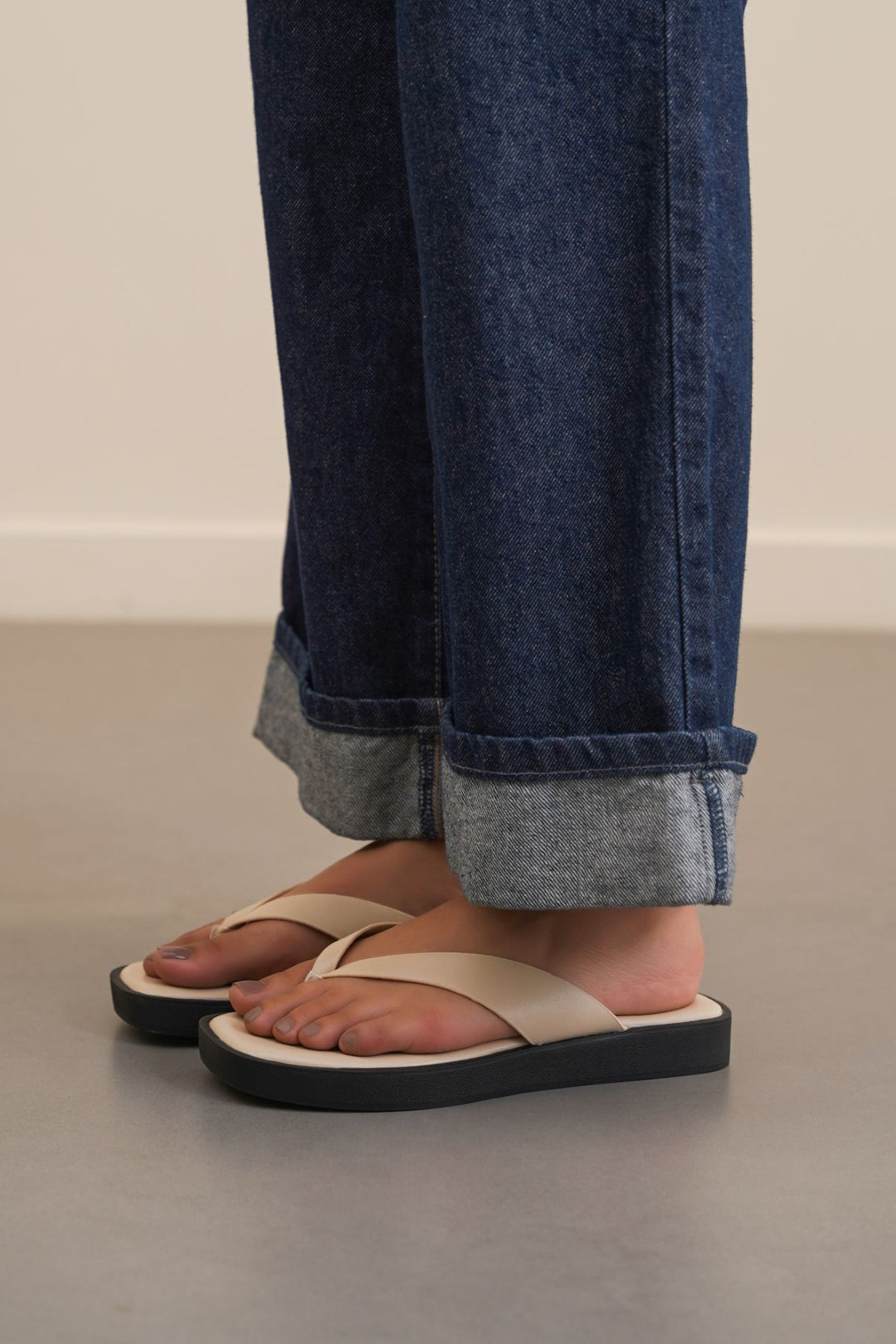 BEIGE MAGAZINE FLIP FLOPS