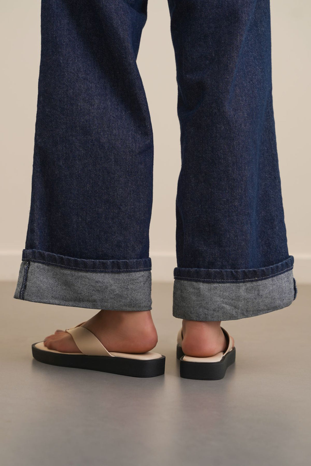 BEIGE MAGAZINE FLIP FLOPS