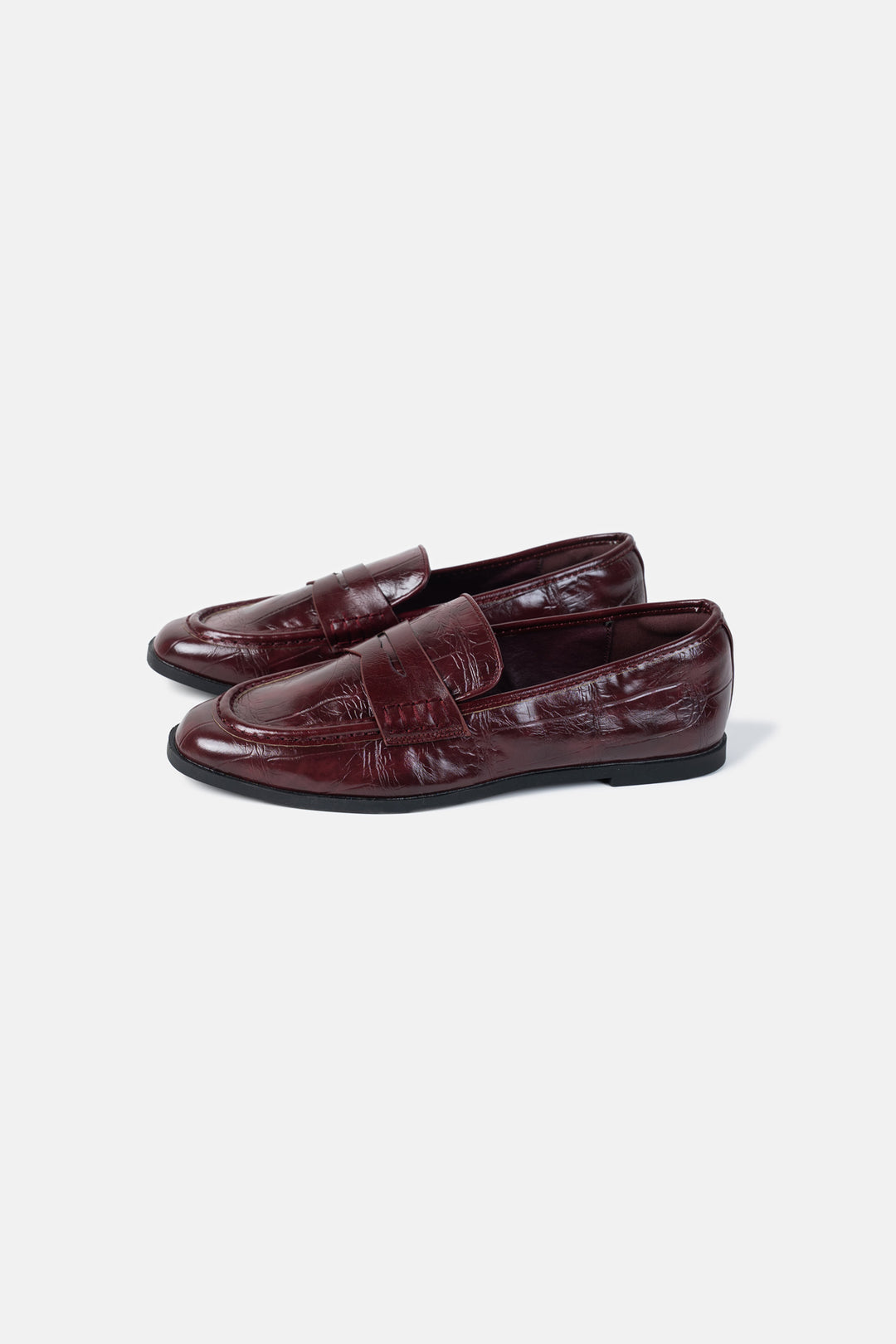 TEXTURED PENNY LOAFERS